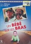 Un bébé sur les bras